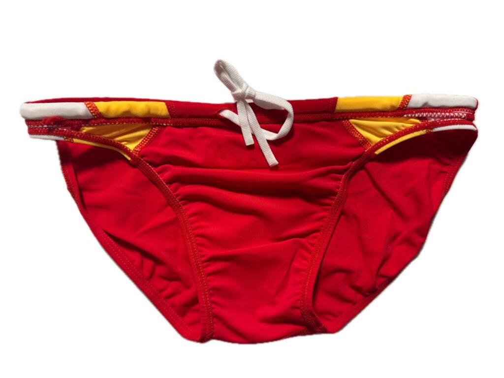 VXA men’s competitive swim brief in Red with white logo, front view inside