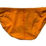 VXA men’s competitive swim brief in orange with white logo, back view
