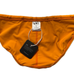 VXA men’s competitive swim brief in orange with white logo, back view inside