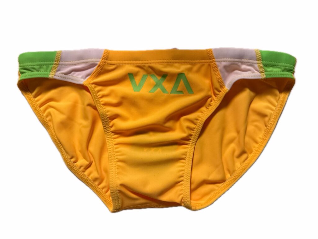 VXA men’s competitive swim brief in yellow with green logo, front view