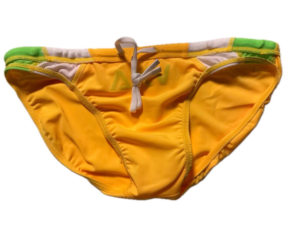 VXA men’s competitive swim brief in yellow with green logo, front view inside