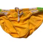 VXA men’s competitive swim brief in yellow with green logo, front view inside